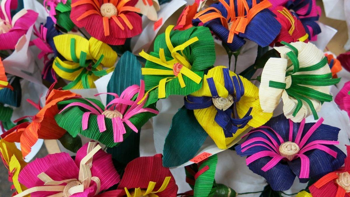 A multi-colored flower bouquet made from corn husks